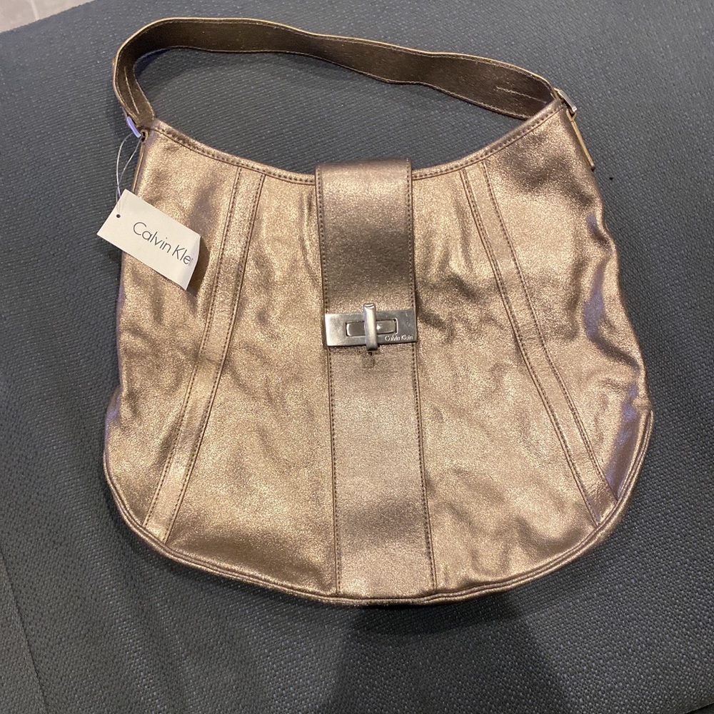 Metallic Calvin Klein purse new with tag